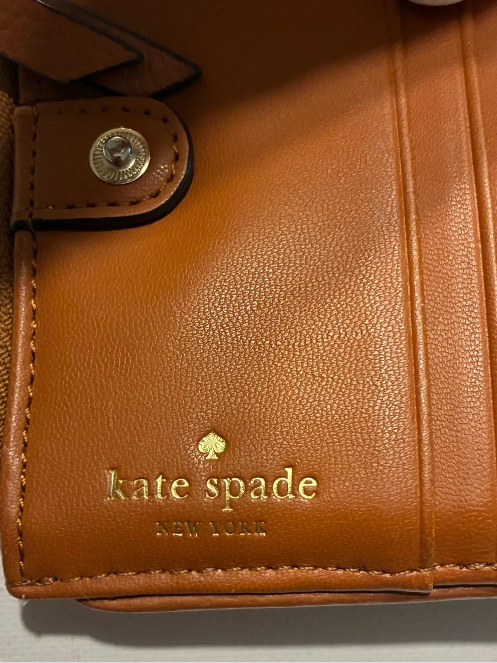 Kate Spade New York EUC Leila Slim Bifold Tan Leather Wallet